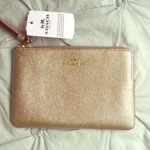 NWT Coach Wristlet in Gold